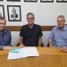 Schmidt, Bello e Cunha na assinatura da renovação